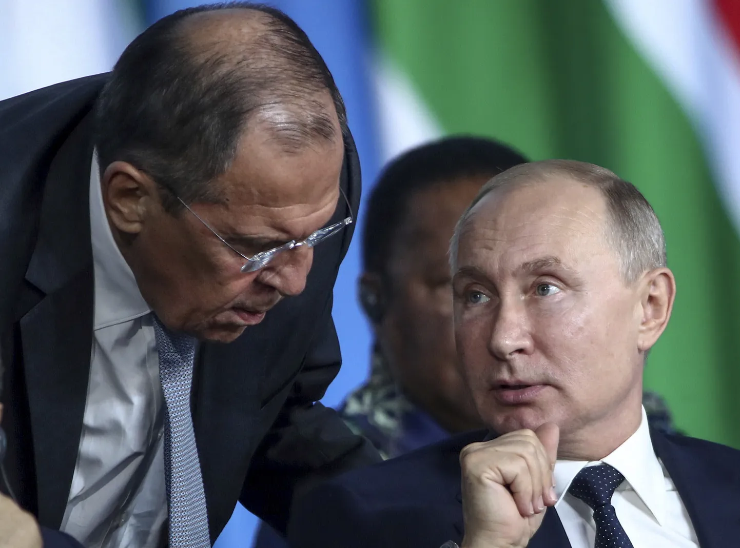 Sergejs Lavrovs un Vladimirs Putins.