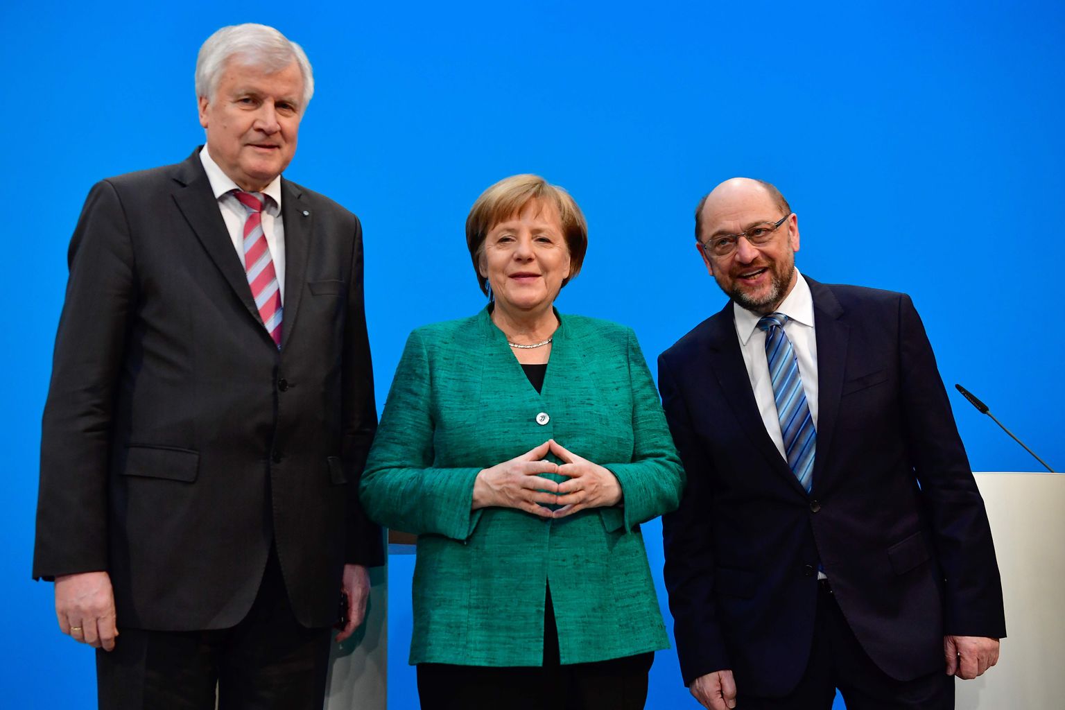 Vasakult: Horst Seehofer (CSU), Angela Merkel (CDU) ja Martin Schulz pärast eilset pressikonverentsi Berliinis.