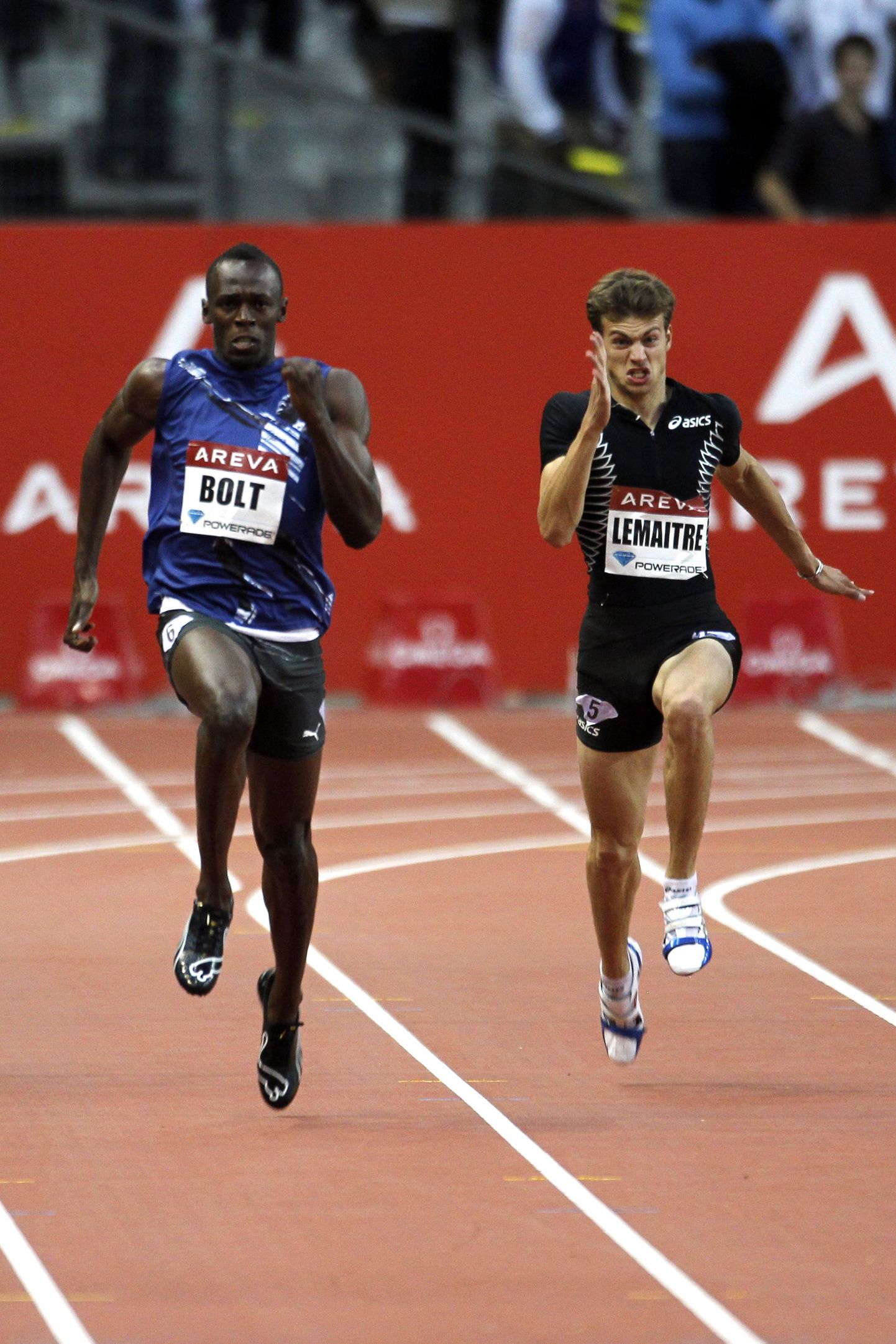 Usain Bolt ja Christophe Lemaitre (paremal)