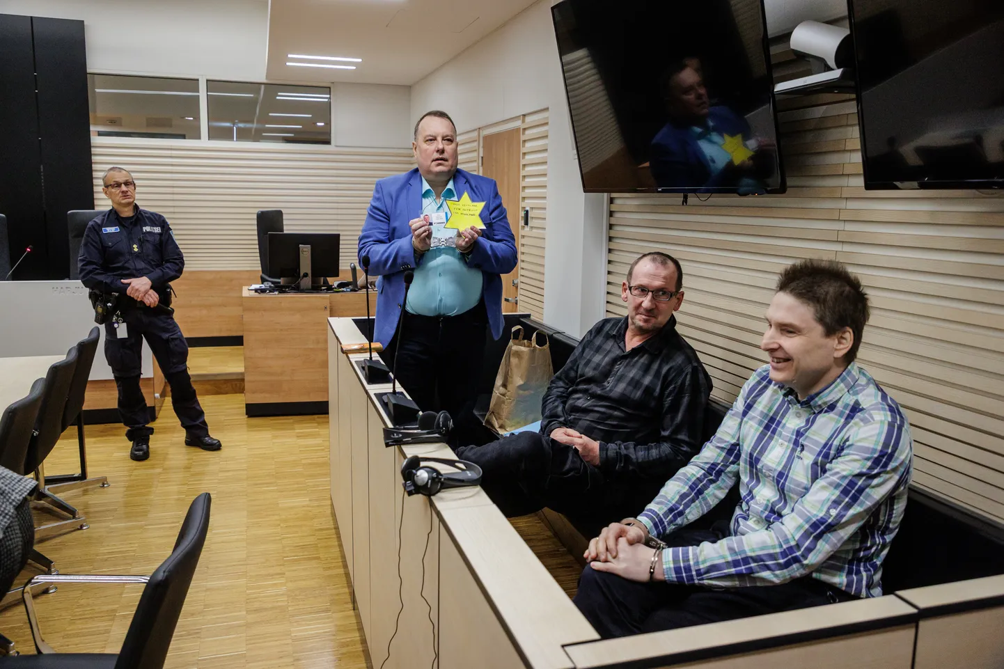 Aivo Peterson, Andrei Andronov, and Dmitri Roots at Harju County Court. The prosecutor accuses Estonian citizens Peterson and Roots of treason, and Russian citizen Andronov of non-violent activities directed against the Republic of Estonia.
