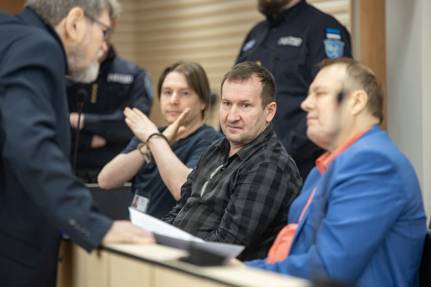 Riigireetmise süüdistuse kohtuprotsess. Esiplaanil Aivo Peterson, keskel Andrei Andronov ja vasakul Dmitri Rootsi.