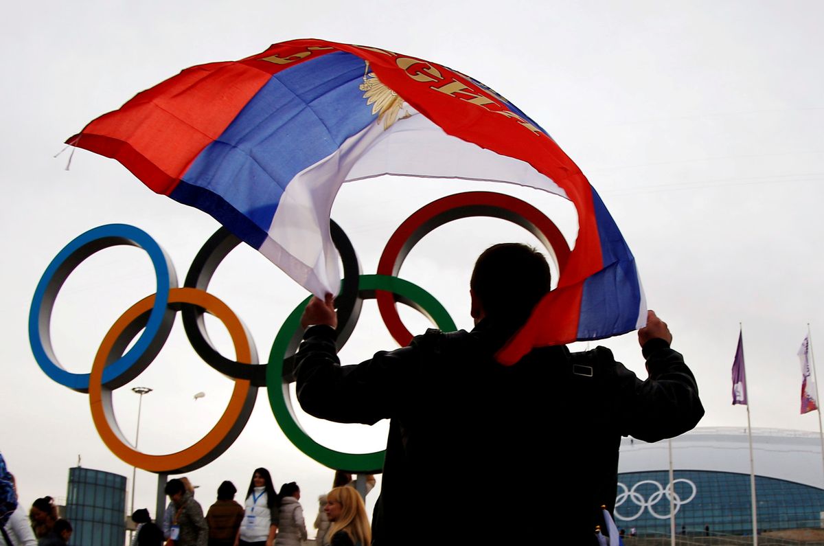 Посетитель Олимпийских игр в Сочи 2014 года.