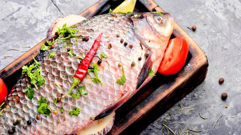 Fresh sea fish with vegetables Fresh sea fish with vegetables