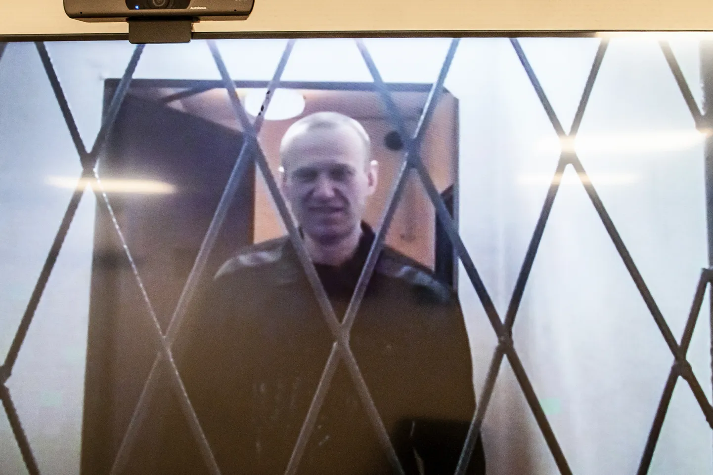 Vene opositsiooniliider Aleksei Navalnõi osalemas kuu enne oma surma vanglast video vahendusel kohtuistungil.