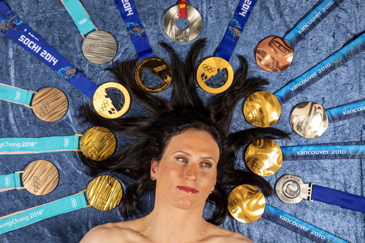 Marit Björgen olümpiamedalitega.