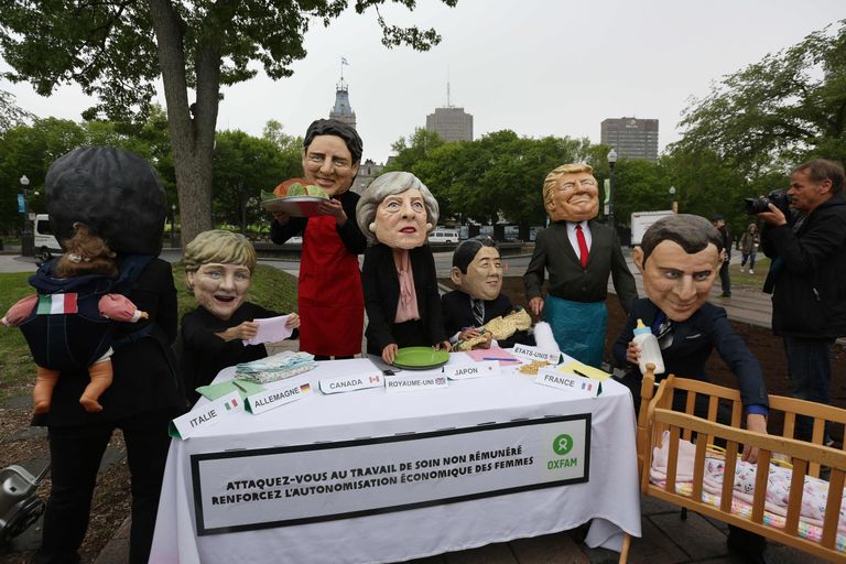 Heategevusorganisatsiooni Oxfam esindajad poseerimas Quebecis maailma mõjuvõimsate liidritena.