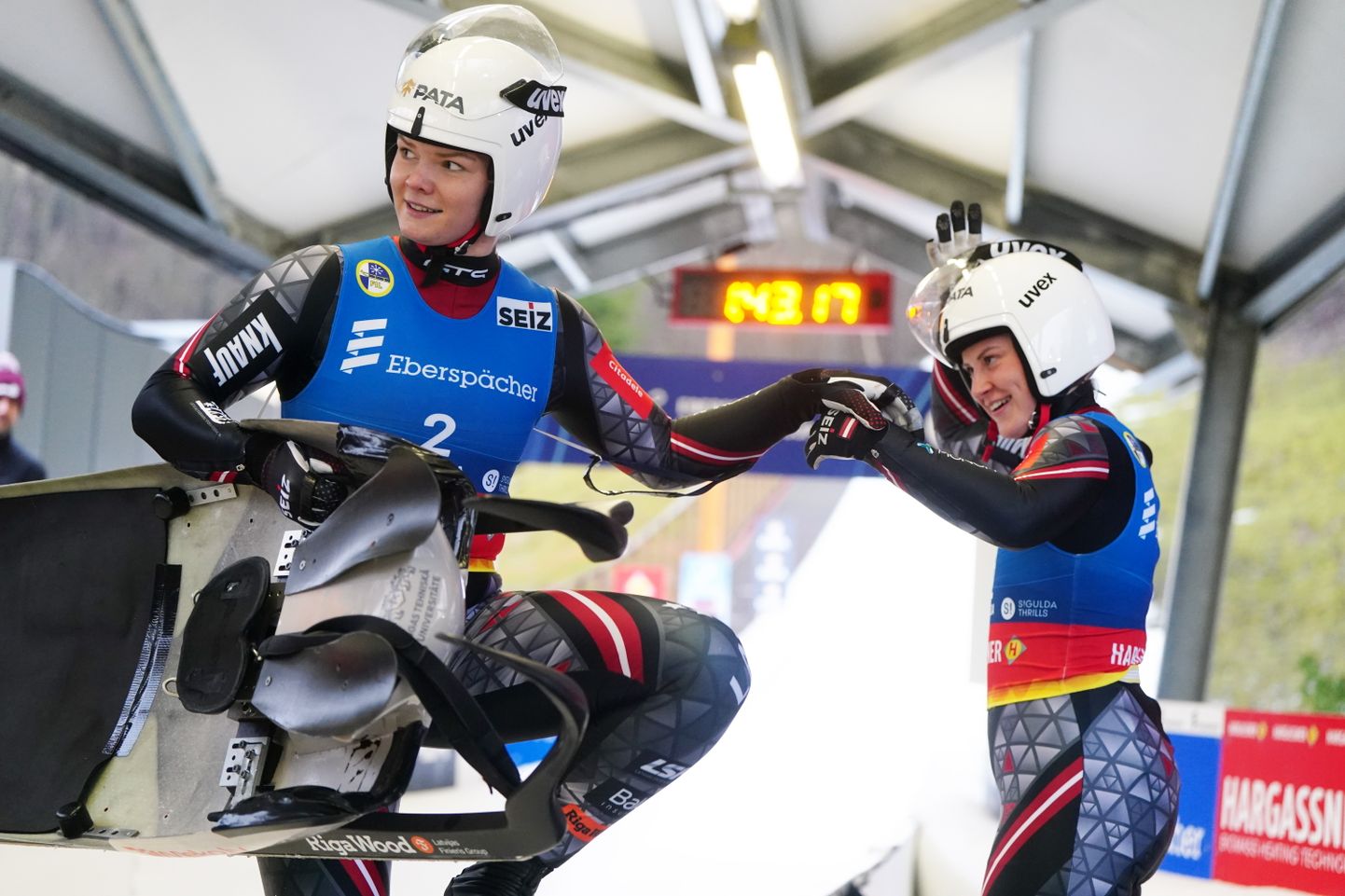"Eberspracher" Pasaules kausa astotais posms kamaniņu sportā sieviešu divvietīgām ekipāžām Siguldas bobsleja un kamaniņu trasē.