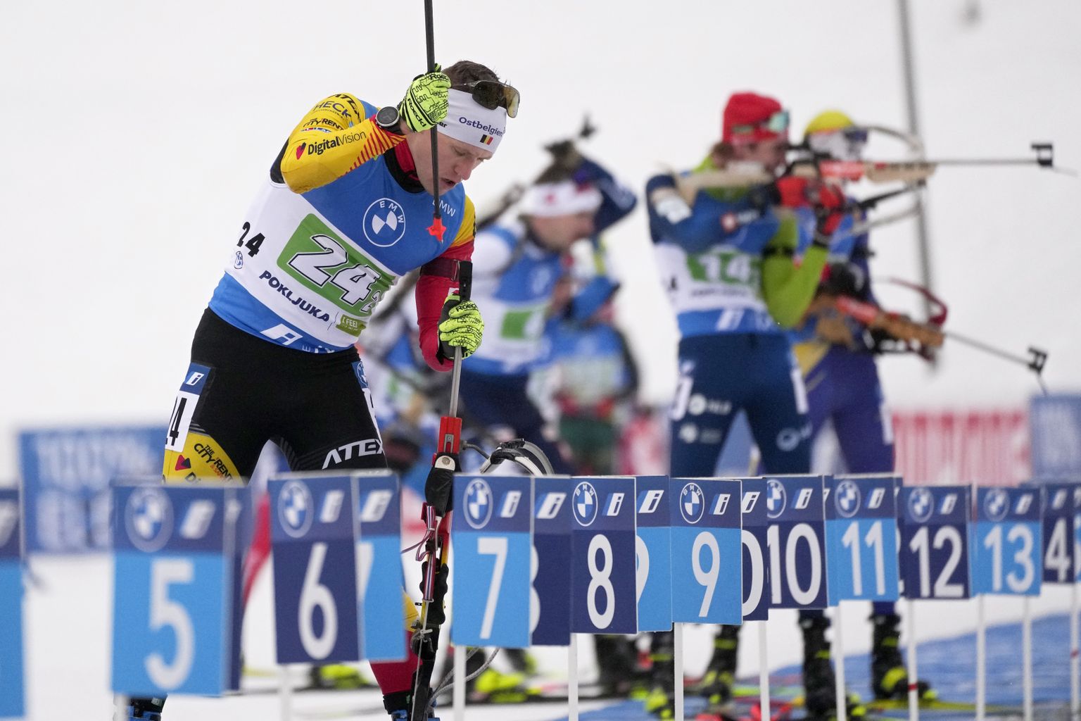 Thierry Langer, of Belgium, tries to fix a problem with his rifle during the Mixed Relay competition at the Biathlon World Cup event in Pokljuka, Slovenia, Sunday, Jan. 8, 2023. (AP Photo/Darko Bandic)  XAF148