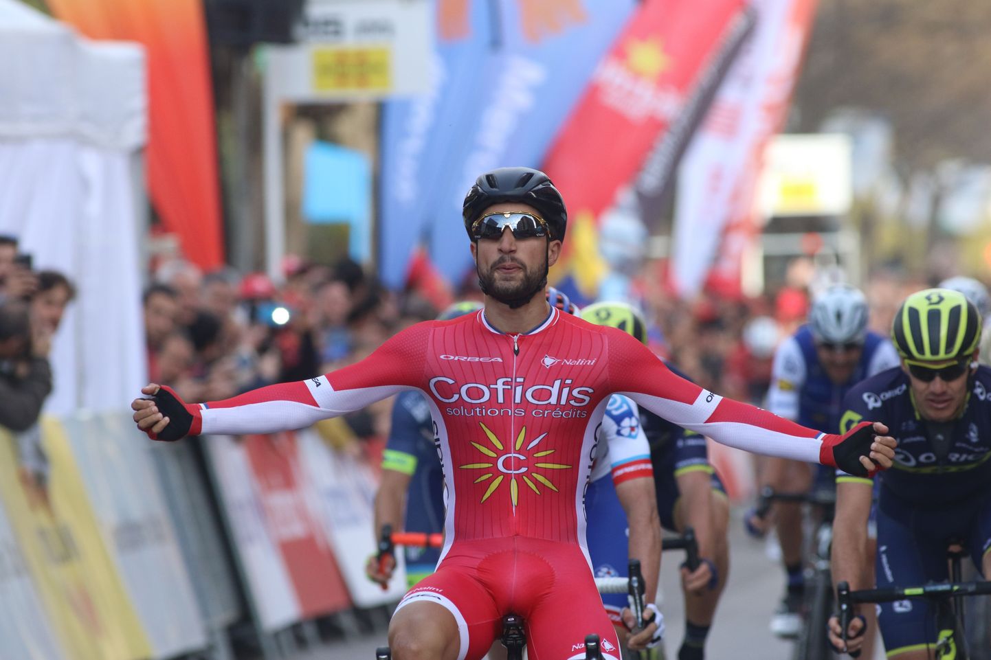 Nacer Bouhanni racing over the finish line to win the Volta Ciclista a Catalunya 2017 -