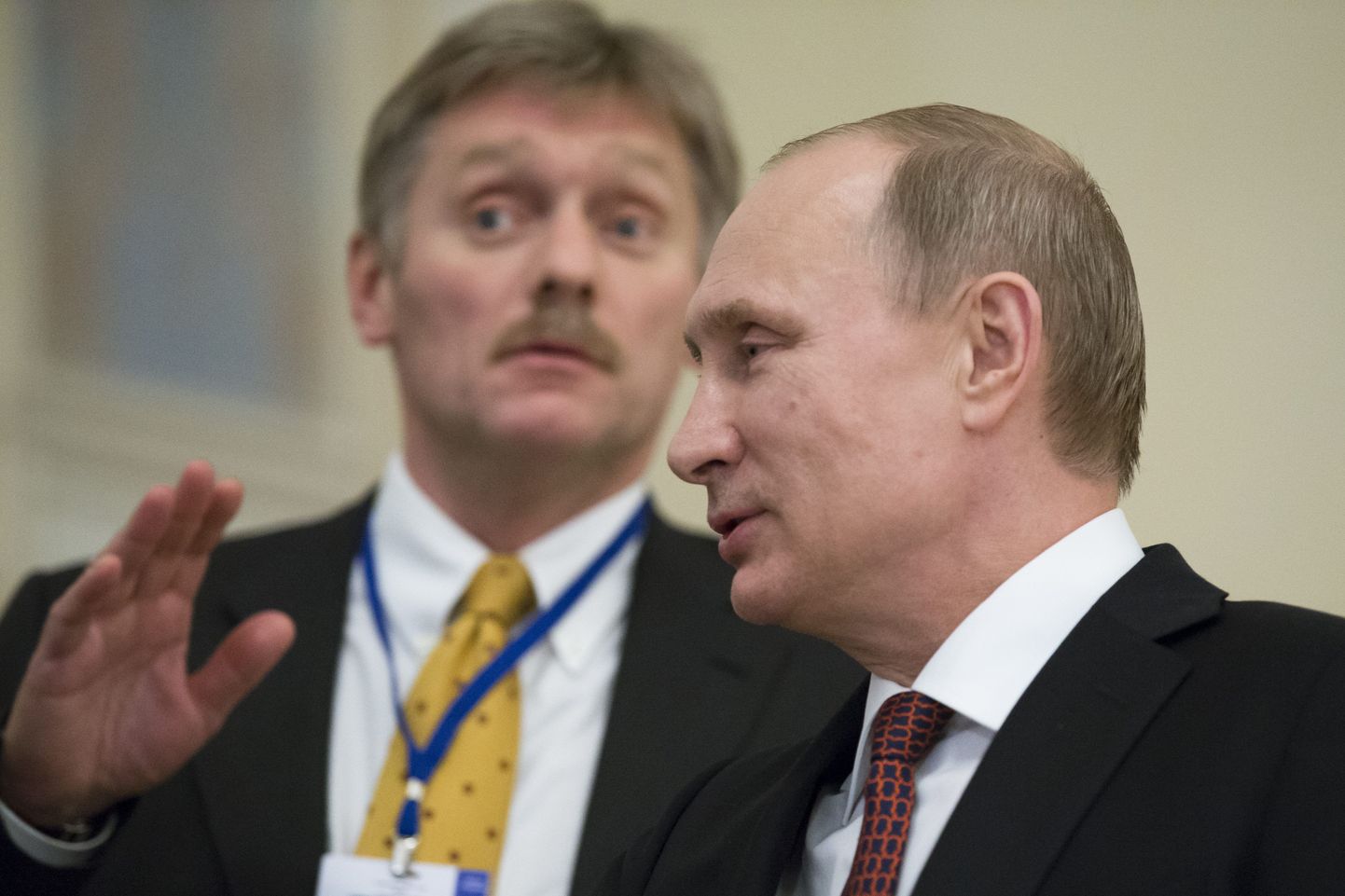 President Vladimir Putin koos pressisekretäri Dmitri Peskoviga.