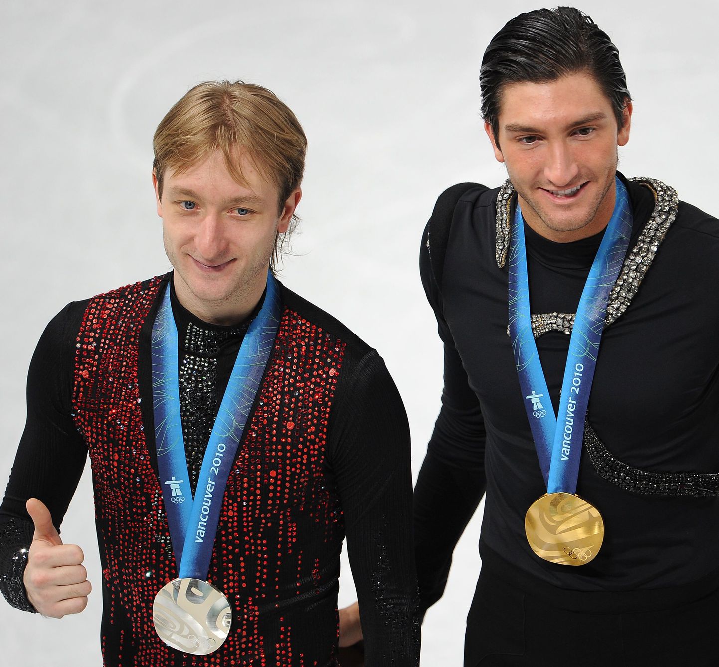 Jevgeni Pljuštšenko (vasakul) ja Evan Lysacek Vancouveri OMi poodiumil.