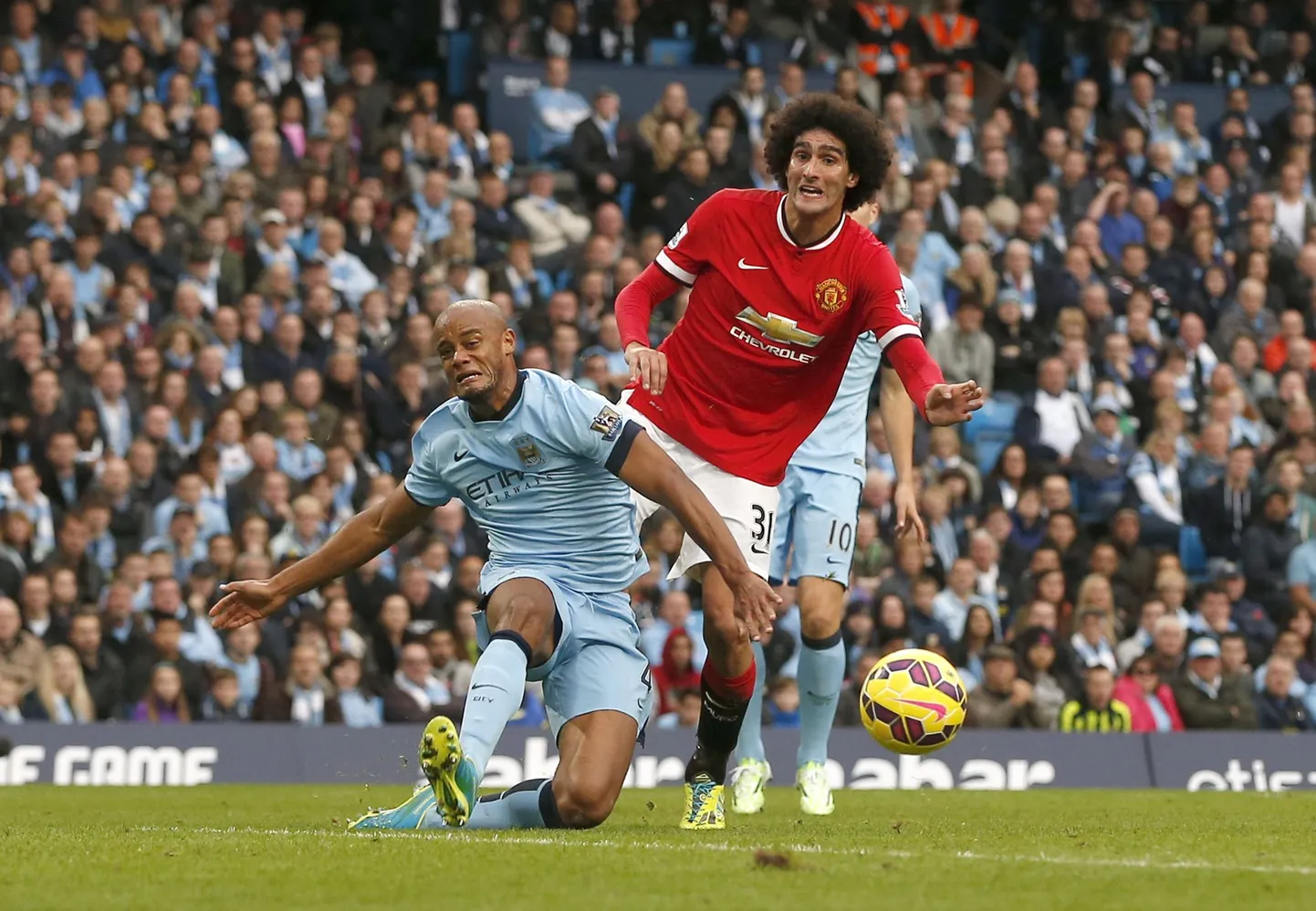 Marouane Fellaini (paremal).