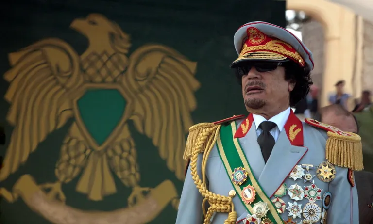 Muammar Gaddafi.