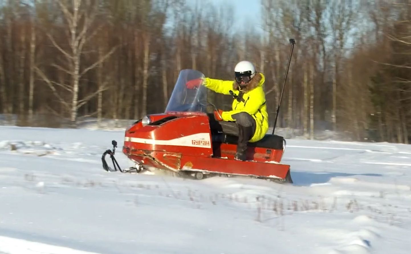 Pauls Timrots uz padomju sniega motocikla Buran