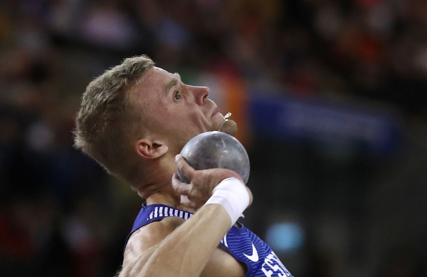 Karl Robert Saluri of Estonia makes an attempt in the shot put of the heptathlon at the European Athletics Indoor Championships at the Emirates Arena in Glasgow, Scotland, Saturday, March 2, 2019. (AP Photo/Alastair Grant)