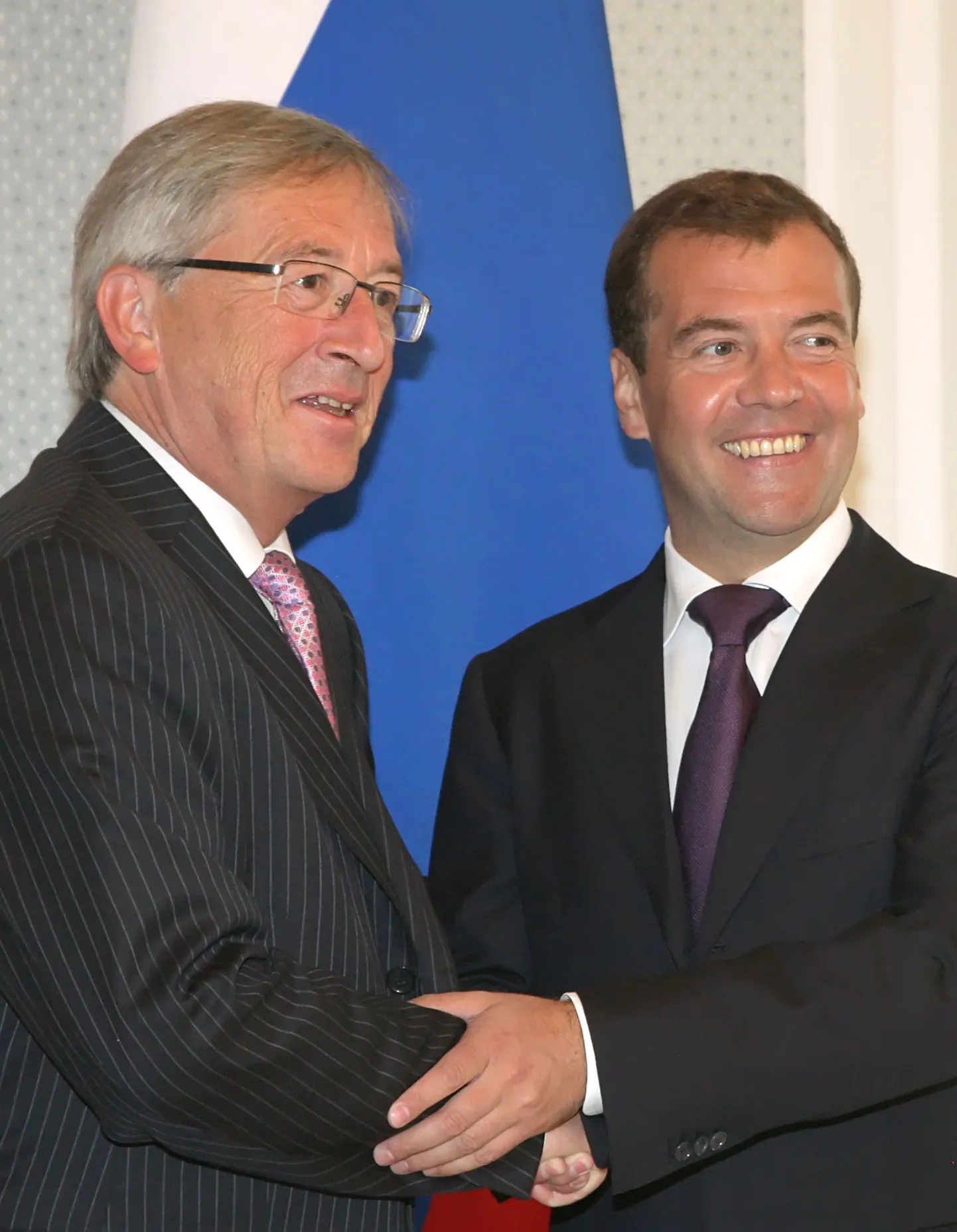 Жан-Клод Юнкер (слева) во время встречи с Дмитрием Медведевым.