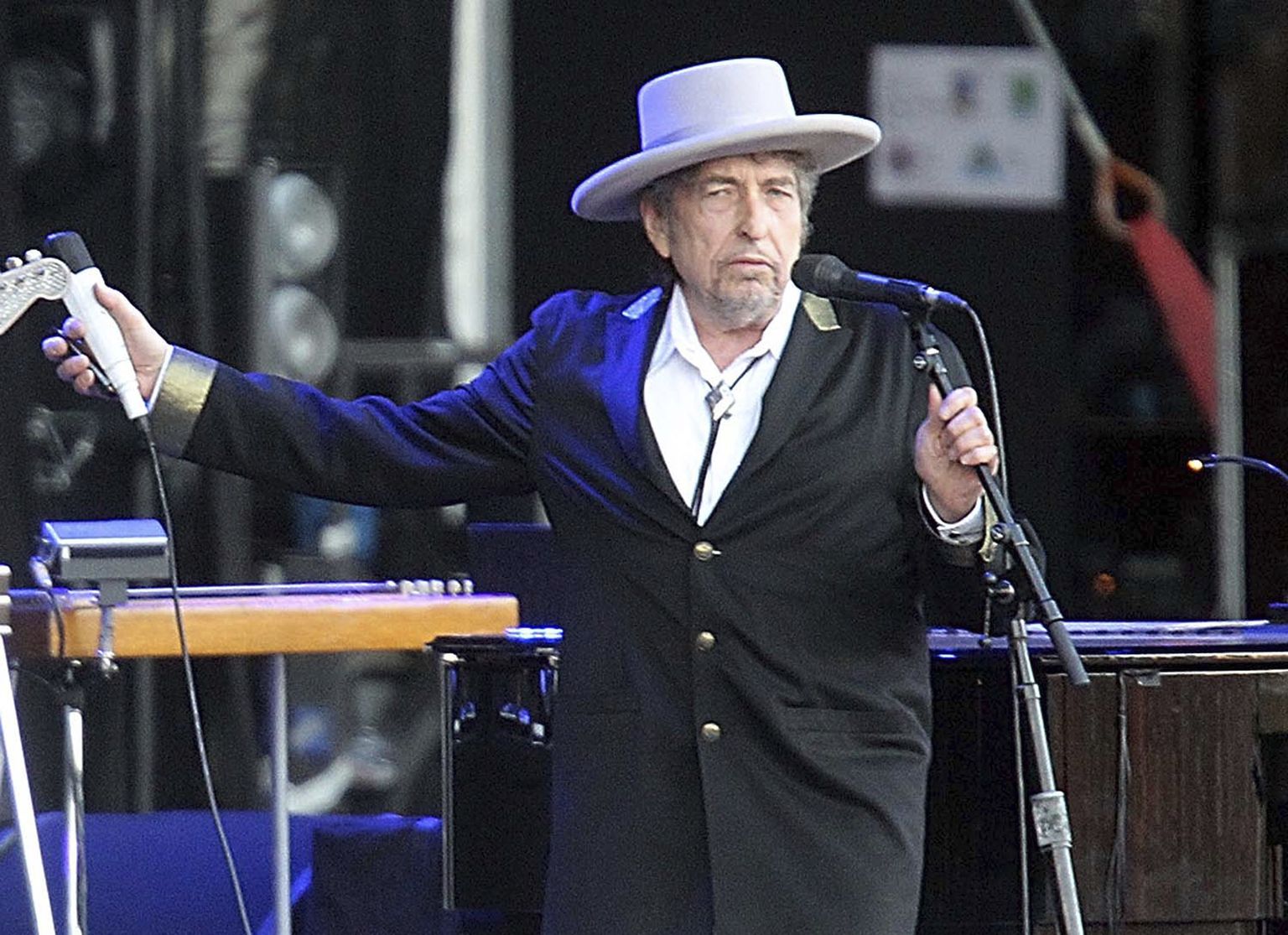 FILE - This July 22, 2012, file photo shows U.S. singer-songwriter Bob Dylan performing onstage at "Les Vieilles Charrues" Festival in Carhaix, western France. Dylan won the 2016 Nobel Prize in literature, announced Thursday, Oct. 13, 2016. (AP Photo/David Vincent, File)