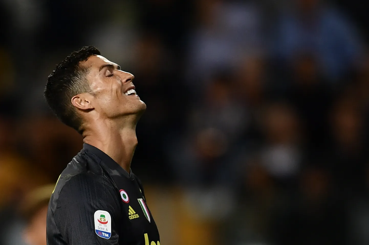 Juventus' Portuguese forward Cristiano Ronaldo reacts during the Italian Serie A football match Parma vs Juventus on September 1, 2018 at Ennio Tardini stadium in Parma. (Photo by Marco BERTORELLO / AFP)