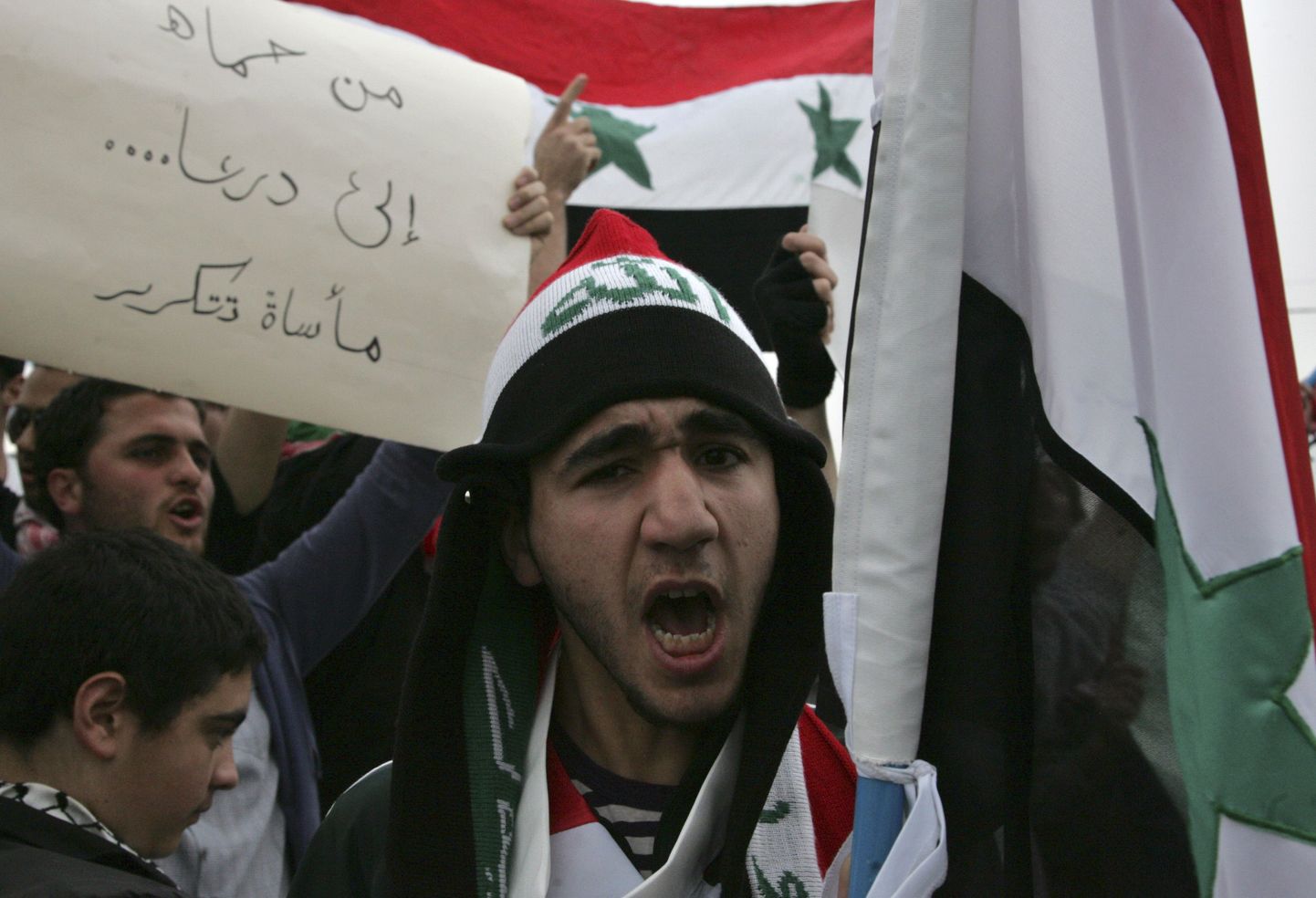 Митинг сирийцев, живущих в Иордании, против правительства Сирии.