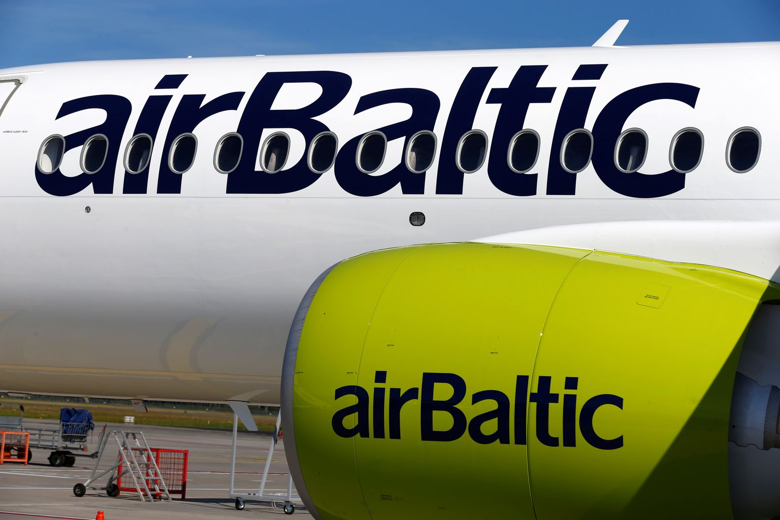 AirBaltic signs are seen on an Airbus A220-300 aircraft at the Riga International Airport, Latvia August 8, 2018. REUTERS/Ints Kalnins