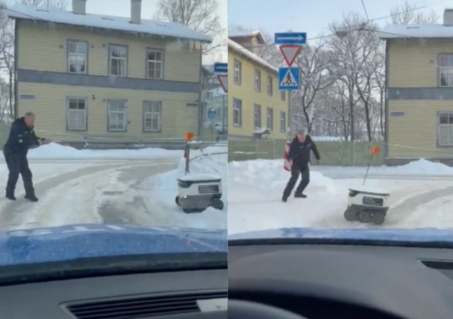 Politseinik suhtles pakirobotiga.