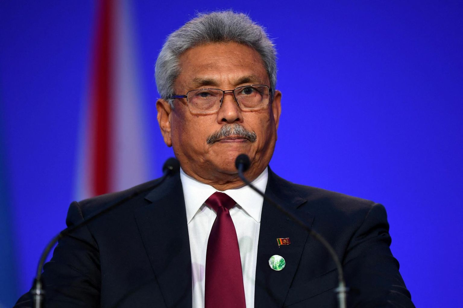 FILE PHOTO: Sri Lanka&#39;s President Gotabaya Rajapaksa presents his national statement as a part of the World Leaders&#39; Summit at the UN Climate Change Conference (COP26) in Glasgow, Scotland, Britain November 1, 2021. Andy Buchanan/Pool via REUTERS/File Photo FOTO: Pool