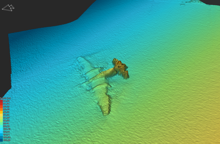 3D pildid merepõhjas lebavast lennukist.
